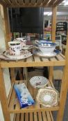 2 trio's, 2 tea cups & saucers and 3 dishes.