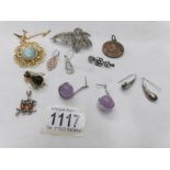 A mixed lot of jewellery including silver earrings, owl pendant, bee brooch etc.