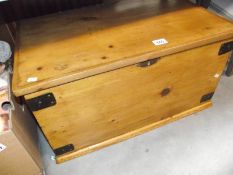 A wooden trunk (missing key)