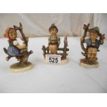 3 Goebel figures of children.