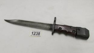 An old bayonet marked M173.