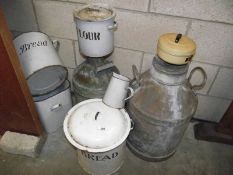 A quantity of enamel bread bins, galvanised churns etc.