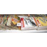 Approximately 75 war and commando comics etc.