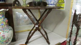 A good quality mahogany butler's tray on stand.