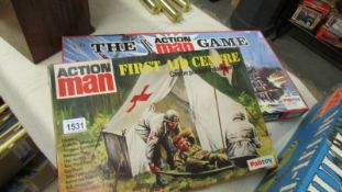 A boxed Palitoy Action Man first aid centre and board game.