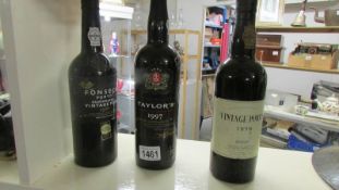 3 bottles of vintage port being Taylors 1997, Fonseca 1986 and Borges 1979.