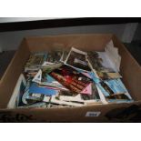 A large box of postcards.