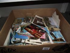 A large box of postcards.