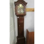 A small mahogany 8 day Grandfather clock.