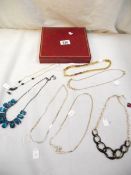 A mixed lot of costume jewellery necklaces.