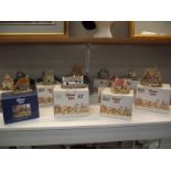12 boxed Lilliput Lane cottages (some boxes a/f)