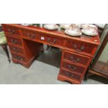 A good quality mahogany double pedestal desk with leather inset top.