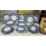 A large flo blue soup tureen, 2 vegetable tureens, a sauce tureen, 6 dinner plates, 6 side plates,