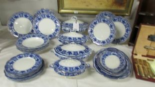 A large flo blue soup tureen, 2 vegetable tureens, a sauce tureen, 6 dinner plates, 6 side plates,