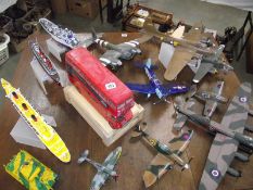 A collection of assembled model aircraft kits including ships, London bus etc., a/f.