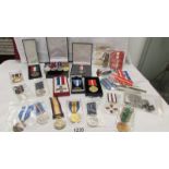 A good collection of medals and ribbons, Afghanistan etc., including some copies.