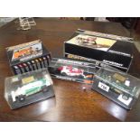 3 boxed Scalextric racing cars, autostart and pitstop kit.