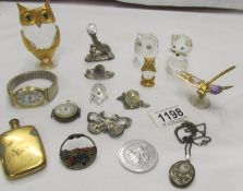 A mixed lot including glass animals, owls, watches etc.