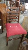 An oak ladder back chair.