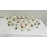 23 pieces of assorted crested china.