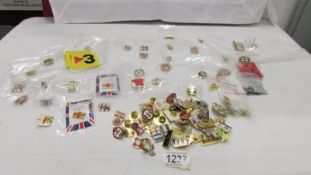 A very good collection of football related pin badges including Sheffield United, England,
