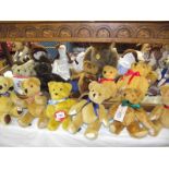 A quantity of teddies by Laura Ashley, Little Folk etc plus rag dolls,