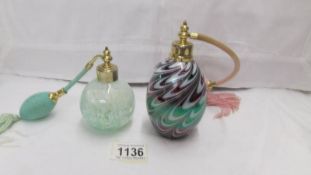 2 glass perfume atomisers,