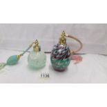 2 glass perfume atomisers,