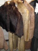 3 fur coats.