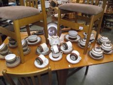 A mixed lot of Denby stoneware dinner ware.