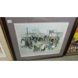 A framed and glazed street scene signed Chapman.