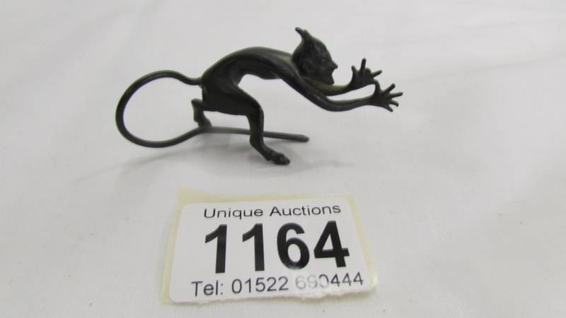 A miniature iron figure of Satan. - Image 2 of 3