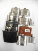 9 assorted hip flasks and some smaller examples.