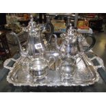 A silver plate tea/coffee set on tray.