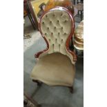 A mahogany framed ladies chair.