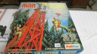 A boxed Palitoy action man training tower.