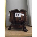 A small wooden planter, 15 cm tall x 14.5 cm diameter with no signs of damage.