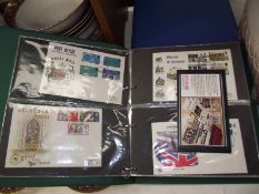 2 folders of First day cover stamps