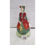 A Royal Doulton figurine 'The Young Miss Nightingale 1820-1910', HN2010.