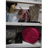 2 shelves of misc. items including evening bags, an Antler travel case, etc.