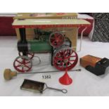 A boxed Mamod steam traction engine.