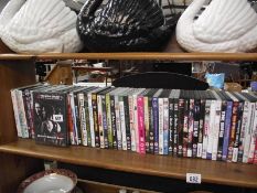 A shelf of dvds