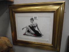 A framed and glazed print of a ballet dancer signed Braitwaite