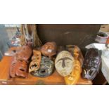 A good collection of tribal wall masks.