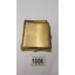 A 9ct gold cigarette case with Birmingham hall mark, 98.6 grams, outer 7.75 x 6.75 cm, inner 7 x 6.