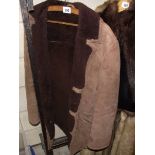 A sheepskin coat, size 38.