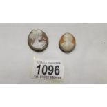 Two cameo brooches/pendants of female profiles.