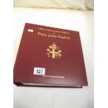 An album of Pope John Paul II first day covers.