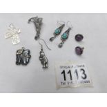 2 pairs of earrings, a marcasite brooch, mother of pearl cross etc.