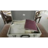 A metal case containing 19th century ephemera, documents etc.